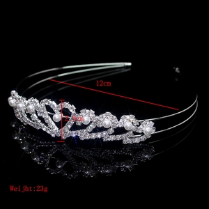 Detail view of silver bridal tiara crown showing 12cm width and 2.5cm height measurements