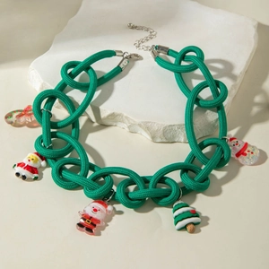 Detail of green woven Christmas necklace featuring Santa and festive enamel charms