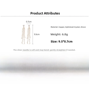 Detailed view of 18k gold plated long tassel earrings measuring 9.5cm and weighing 6.8g