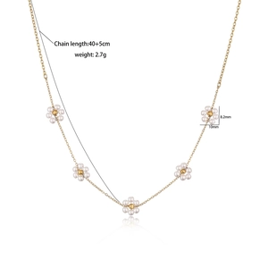 Gold plated copper necklace with pearl flower pendant and cubic zirconia details