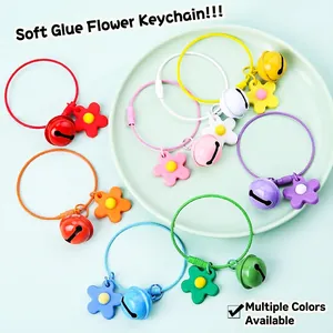 Colorful DIY flower keychain with soft rubber sunflower charms and matching metal bells