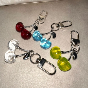 Glittering 3D cherry pendants in four vibrant colors for bags and keyrings