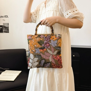 Brown linen handbag with floral embroidery, sequins, and bamboo handle for women
