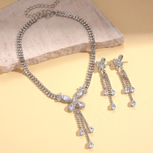 Elegant silver tassel jewelry set with butterfly zircon necklace and matching earrings
