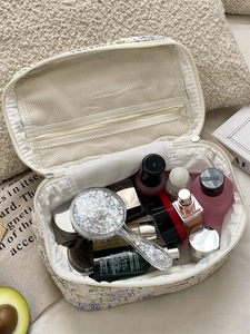 Floral makeup bag with large capacity and mesh compartments for travel toiletries