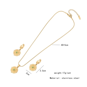Detailed view of sunburst jewelry set with green stones and precise size dimensions