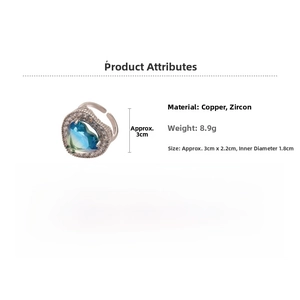 Detailed specs of heart ring showing blue zircon, copper material and 8.9g weight