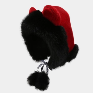Winter plush trapper hat with fox ears and black pom-poms in red and black contrast