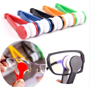 Detail of portable tweezers-style eyeglass cleaner with microfiber pads in multiple colors