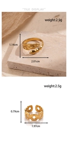 Detailed view of adjustable golden stainless steel leaf and woven open ring designs
