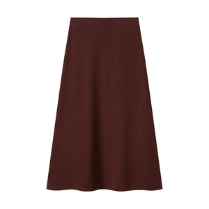 Detail view of a brown A-line skirt with smooth drape and elegant minimalist cut
