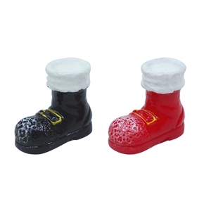 Miniature resin Santa Claus boots in red and black with white trim and gold buckle decor