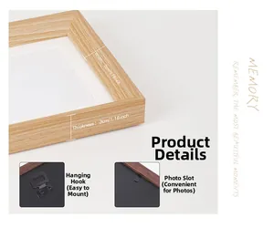 Macro detail of natural wood photo frame with 3cm thick edge and metal back hardware