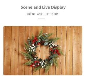 Detail of Christmas wreath with red berries, pine cones and eucalyptus on wood