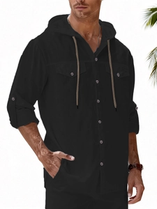Detail of men's black linen hooded shirt with front flap pockets and drawstring hood