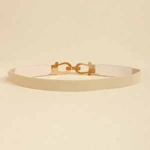 Detailed close-up of beige elastic waist belt with elegant interlocking gold buckle