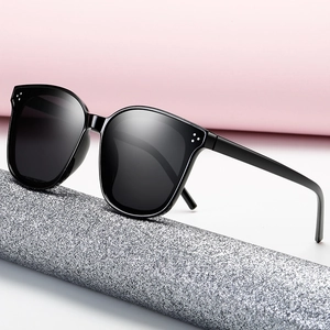 Stylish black oversized square sunglasses with three-point metal accent on the temple