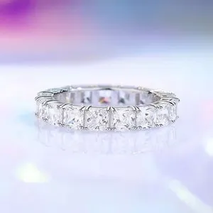 Macro view of S925 sterling silver eternity band with square-cut cubic zirconia stones