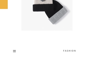 Detail of cable knit pattern and wide fold-over cuffs on winter beanies