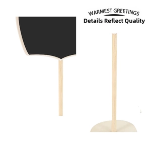 Detail of wooden mini chalkboard sign with round base for tabletop party decor