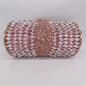 Detail of pink crystal encrusted evening clutch with marquise rhinestones and gold frame