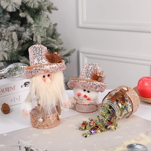 Christmas snowman and Santa candy jars with rose gold sequins and clear storage containers