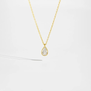 Minimalist gold S925 sterling silver chain featuring a pear-cut white teardrop pendant