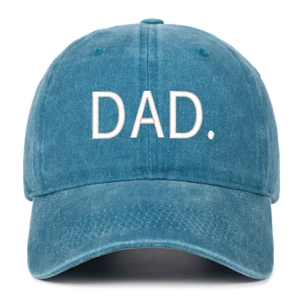 Detail of blue washed cotton baseball cap featuring white embroidered DAD. text