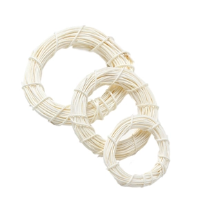 Three assorted sizes of cream Indonesian rattan rings for DIY craft and holiday decor