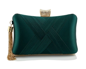 Detail of emerald green pleated satin clutch with crystal buckle and gold tassel