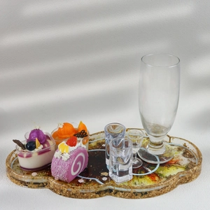 Artistic cloud shaped resin tray with gold foil edge and faux dessert decorations