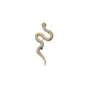 Elegant gold-plated snake brooch with micro-paved white zircons on a white background