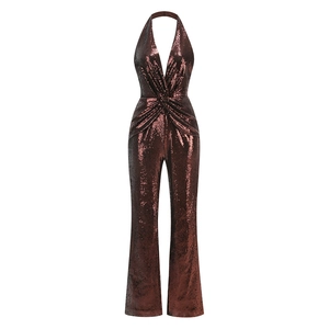 Detailed view of bronze sequin halter jumpsuit with deep V-neck and open back design