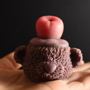 Detailed close-up of a bear-shaped silicone mold featuring realistic fur texture details