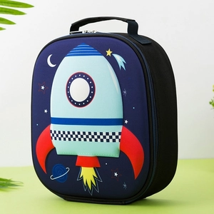 Detail of the space rocket cartoon pattern on the deep blue kids insulated lunch bag