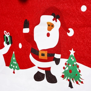 Detail of Christmas chair cover showing felt Santa Claus and festive tree appliques