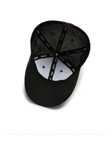 Detail view of the black mesh sports cap interior with SPORT webbing and red label