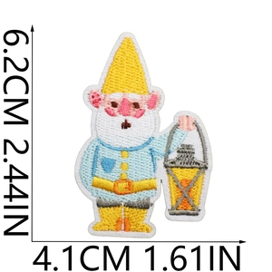 Embroidered gnome patch with lantern, yellow and blue stitching, size 6.2cm x 4.1cm