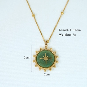 Detail view of African Jade pendant showing dimensions 2cm x 2cm with star motif