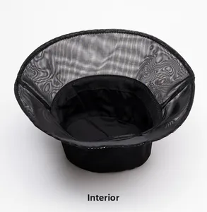 Detail view of the black sun hat interior showing breathable mesh brim and sweatband