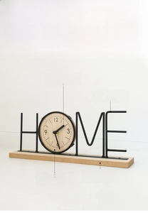 Macro detail of Nordic HOME letter clock with iron frame and natural wooden base