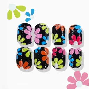 Short square black press-on nails with vibrant colorful daisy floral patterns
