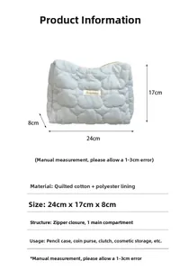 Detailed view of light blue quilted cotton cosmetic bag with dimensions 24x17x8cm