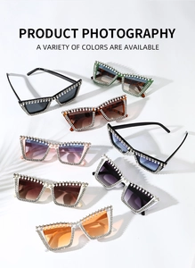 Detail of oversized sunglasses with pearl and rhinestone accents in multiple colors