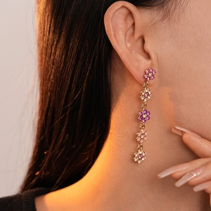 Boucles d'oreilles pendantes fleurs élégantes avec strass colorés et pampilles dorées