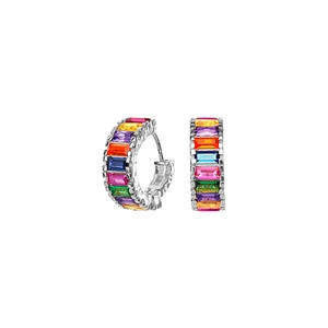 Macro detail of S925 sterling silver hoop earrings with colorful baguette-cut zircons