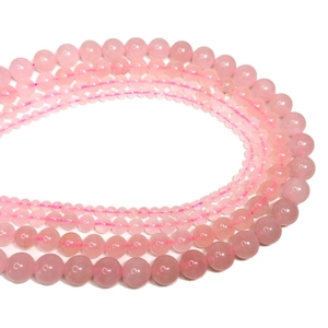 Detail of pink crystal natural stone beads in various sizes for DIY jewelry making