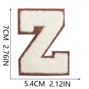 Detailed size view of chenille letter Z patch in cream with brown embroidered border