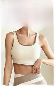 Detail of high-stretch sports bra with seamless trim and contrast color edging