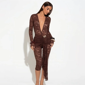 Detail of dark brown lace bodysuit featuring deep V-neck, long sleeves, and waist tie design